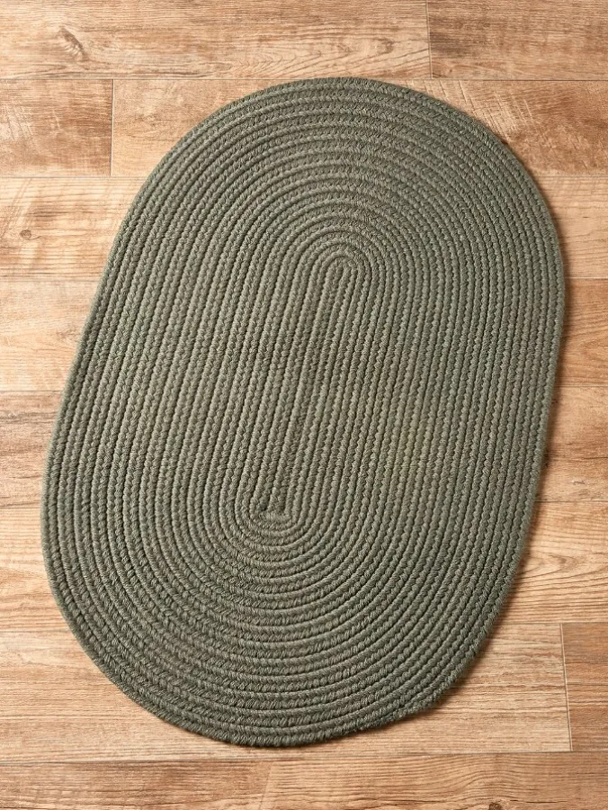 Northshire Solid Color Oval Braided Wool Rug
