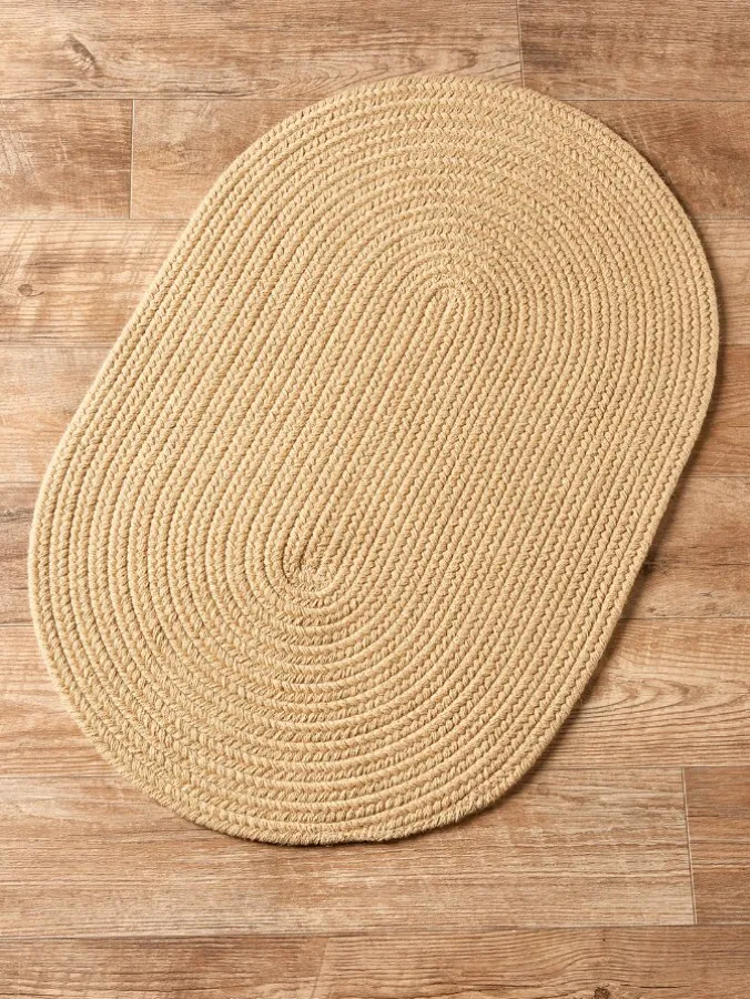 Northshire Solid Color Oval Braided Wool Rug