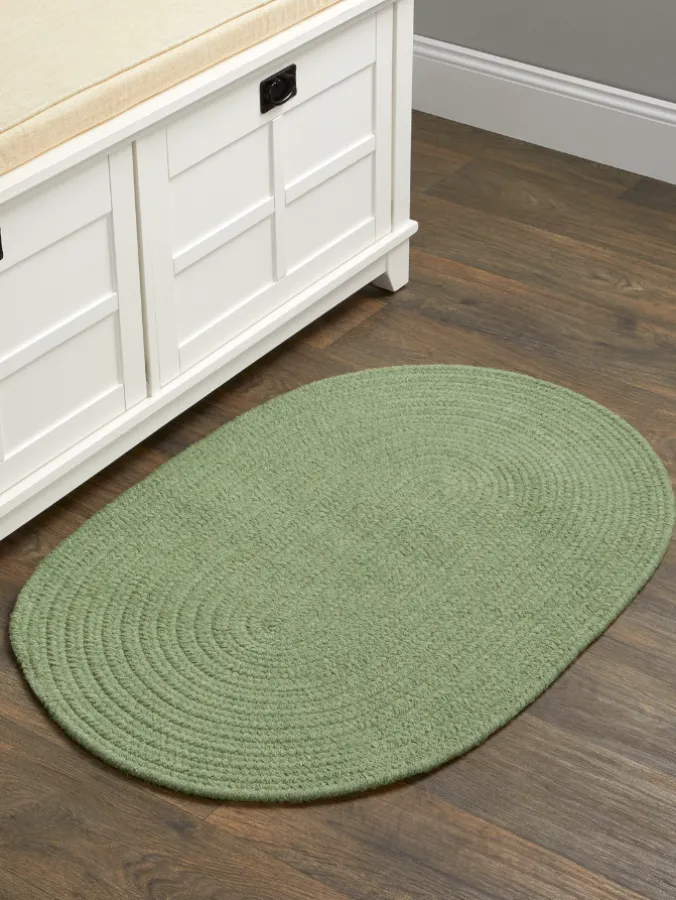 Northshire Solid Color Oval Braided Wool Rug